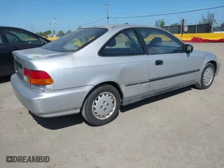 1997 Honda Civic DX with VIN 1HGEJ6220VL106203, listed as a IAAI auction lot 42098813 with 192,343 mi miles. Bid and sale history available at carsss.com. Image 4.