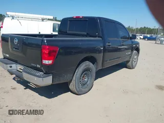 2011 Nissan Titan SV with VIN 1N6BA0ED0BN320293, listed as a IAAI auction lot 41670130 with 229,776 mi miles and . Bid and sale history available at DreamBid. Image 4.