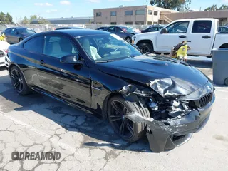 2015 BMW M4 with VIN WBS3R9C58FK334247, listed as a IAAI auction lot 41940211 with 125,881 mi miles. Bid and sale history available at carsss.com. Image 1.