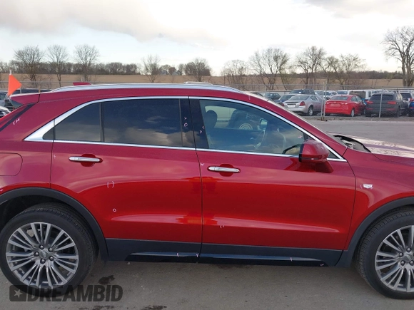 2024 Cadillac XT4 AWD Premium Luxury z VIN 1GYFZDR40RF102464, wystawiony jako IAAI lot #41968335 z przebiegiem 25 676 mil mil oraz . Historia ofert i sprzedaży dostępna na DreamBid. Obrazek 13.