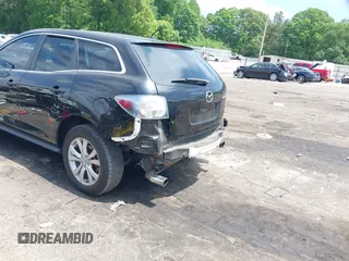 2010 Mazda CX-7 Touring z VIN JM3ER2W30A0341657, wystawiony jako IAAI lot #42123453 z przebiegiem 173 135 mil mil oraz . Historia ofert i sprzedaży dostępna na DreamBid. Obrazek 12.