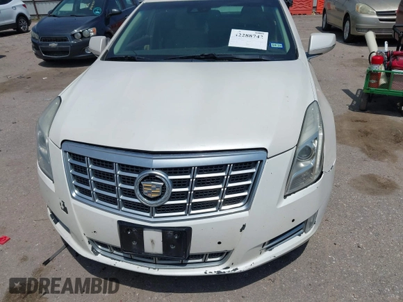 2013 Cadillac XTS Premium z VIN 2G61S5S33D9235025, wystawiony jako IAAI lot #42288742 z przebiegiem 180 221 mil mil oraz . Historia ofert i sprzedaży dostępna na DreamBid. Obrazek 12.