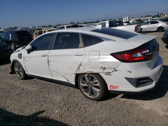 2018 Honda Clarity Touring z VIN JHMZC5F33JC002904, wystawiony jako Copart lot #55535325 z przebiegiem Nie podano mil oraz Szkoda całkowita • Salvage title. Historia ofert i sprzedaży dostępna na DreamBid. Obrazek 2.
