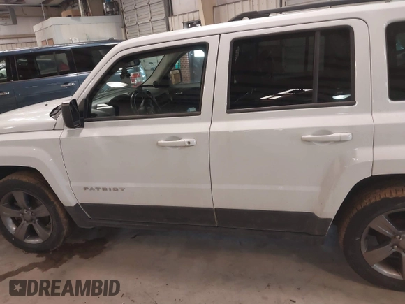 2014 Jeep Patriot Latitude with VIN 1C4NJPFA3ED739925, listed as a IAAI auction lot 41623546 with 130,374 mi miles and . Bid and sale history available at carsss.com. Image 14.