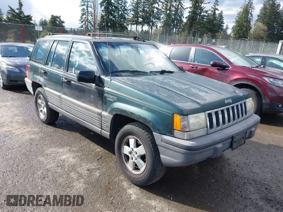 1995 Jeep Grand Cherokee Laredo with VIN 1J4GZ58SXSC676393, listed as a IAAI auction lot 41943464 with 244,317 mi miles. Bid and sale history available at carsss.com. Image 1.
