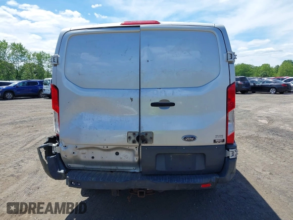 2015 Ford Transit Cargo with VIN 1FTNR1ZM5FKA40014, listed as a IAAI auction lot 42258737 with 177,501 mi miles and . Bid and sale history available at DreamBid. Image 16.