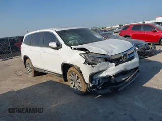 2021 Honda Pilot EX-L with VIN 5FNYF5H58MB025685, listed as a IAAI auction lot 34040082 with 13,518 mi miles. Bid and sale history available at carsss.com. Image 1.