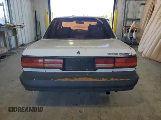 1991 Toyota Camry z VIN 4T1SV24E0MU402588, wystawiony jako Copart lot #82920114 z przebiegiem 124 644 mil mil oraz Szkoda całkowita • Salvage title. Historia ofert i sprzedaży dostępna na DreamBid. Obrazek 6.
