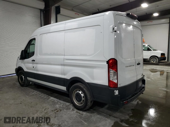 2019 Ford Transit with VIN 1FTYE1CMXKKB76439, listed as a Copart auction lot 43841795 with 232,061 mi miles and Salvage Title. Bid and sale history available at DreamBid. Image 2.
