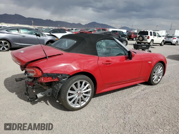 2017 FIAT 124 Spider Lusso z VIN JC1NFAEK5H0123760, wystawiony jako Copart lot #55865845 z przebiegiem 52 285 mil mil oraz Szkoda całkowita • Salvage title. Historia ofert i sprzedaży dostępna na DreamBid. Obrazek 3.