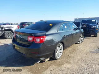 2014 Chevrolet Malibu LTZ with VIN 1G11J5SX5EF217016, listed as a IAAI auction lot 41629836 with 1 mi miles. Bid and sale history available at carsss.com. Image 4.