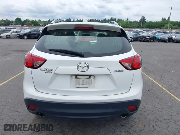 2016 Mazda CX-5 Sport with VIN JM3KE4BY7G0764563, listed as a IAAI auction lot 42279993 with 128,950 mi miles and . Bid and sale history available at DreamBid. Image 16.