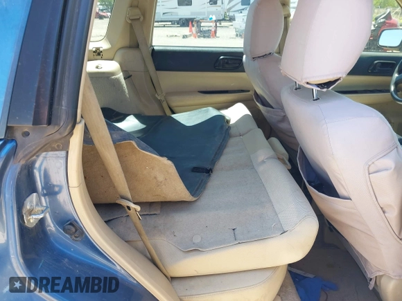 2007 Subaru Forester X with VIN JF1SG63627G718079, listed as a IAAI auction lot 42290134 with 303,089 mi miles and . Bid and sale history available at DreamBid. Image 8.
