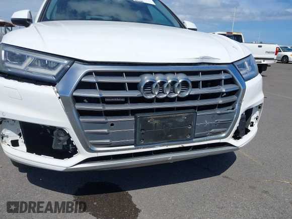 2018 Audi Q5 Premium Plus z VIN WA1BNAFY0J2239383, wystawiony jako IAAI lot #42384069 z przebiegiem 44 069 mil mil oraz . Historia ofert i sprzedaży dostępna na DreamBid. Obrazek 6.