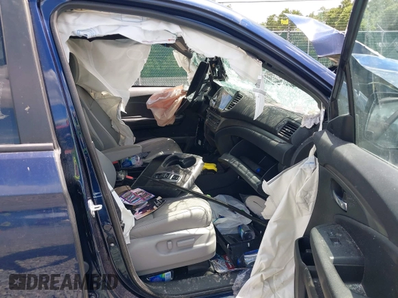 2021 Honda Passport EX-L with VIN 5FNYF8H51MB020250, listed as a IAAI auction lot 40009629 with 54,239 mi miles and . Bid and sale history available at DreamBid. Image 5.