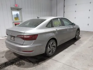 2020 Volkswagen Jetta SEL z VIN 3VWE57BU0LM087350, wystawiony jako IAAI lot #41581637 z przebiegiem 60 528 mil mil oraz . Historia ofert i sprzedaży dostępna na DreamBid. Obrazek 4.