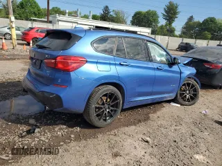 2017 BMW X1 xDrive28i with VIN WBXHT3C32H5F81460, listed as a Copart auction lot 55998515 with 123,853 mi miles and Salvage title. Bid and sale history available at DreamBid. Image 3.