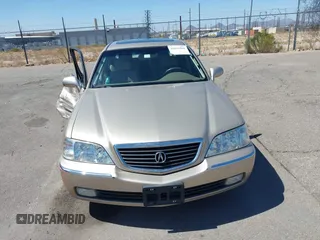 2000 Acura RL with VIN JH4KA9656YC001269, listed as a IAAI auction lot 41831469 with 158,504 mi miles. Bid and sale history available at carsss.com. Image 13.