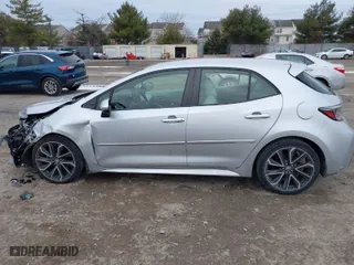 2019 Toyota Corolla Hatchback SE with VIN JTNK4RBE6K3064695, listed as a IAAI auction lot 41296362 with 56,282 mi miles. Bid and sale history available at carsss.com. Image 14.