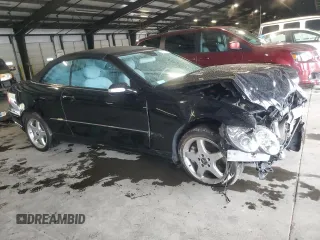 2004 Mercedes-Benz CLK 500 with VIN WDBTK75G34T031610, listed as a Copart auction lot 73182024 with 107,955 mi miles and Salvage Title. Bid and sale history available at DreamBid. Image 4.
