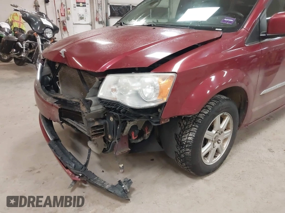 2012 Chrysler Town & Country Touring with VIN 2C4RC1BG1CR314023, listed as a IAAI auction lot 41078817 with Not Provided miles and . Bid and sale history available at DreamBid. Image 6.