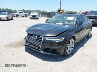 2016 Audi A6 Premium Plus with VIN WAUGFAFC0GN166596, listed as a IAAI auction lot 42526292 with 106,584 mi miles and . Bid and sale history available at DreamBid. Image 6.