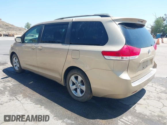 2012 Toyota Sienna LE AAS with VIN 5TDKK3DC5CS186077, listed as a IAAI auction lot 40265988 with 130,888 mi miles and . Bid and sale history available at DreamBid. Image 3.