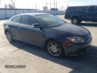 2006 Scion tC z VIN JTKDE177760134694, wystawiony jako Copart lot #43653465 z przebiegiem 245 961 mil mil oraz Szkoda całkowita • Salvage title. Historia ofert i sprzedaży dostępna na DreamBid. Obrazek 4.