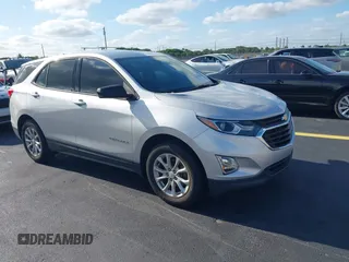2019 Chevrolet Equinox LS z VIN 2GNAXHEV3K6230992, wystawiony jako IAAI lot #42211467 z przebiegiem 82 291 mil mil oraz . Historia ofert i sprzedaży dostępna na DreamBid. Obrazek 1.