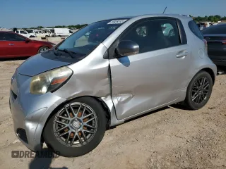 2012 Scion iQ z VIN JTNJJXB05CJ010539, wystawiony jako Copart lot #56489245 z przebiegiem 114 623 mil mil oraz Szkoda całkowita • Salvage title. Historia ofert i sprzedaży dostępna na DreamBid. Obrazek 1.