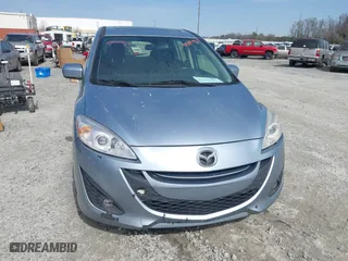 2012 Mazda Mazda5 Grand Touring with VIN JM1CW2DL1C0142664, listed as a IAAI auction lot 41585909 with 211,875 mi miles. Bid and sale history available at carsss.com. Image 6.