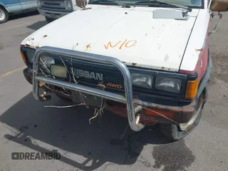 1984 Datsun 720 z VIN JN6ND06Y5EW020107, wystawiony jako IAAI lot #42281402 z przebiegiem 224 687 mil mil oraz . Historia ofert i sprzedaży dostępna na DreamBid. Obrazek 6.