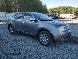2009 Lincoln MKX with VIN 2LMDU88C69BJ13322, listed as a Copart auction lot 70686844 with 129,384 mi miles and Salvage Title. Bid and sale history available at carsss.com. Image 4.