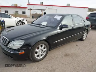 2001 Mercedes-Benz S-Class with VIN WDBNG75J71A135899, listed as a IAAI auction lot 41534215 with 51,646 mi miles. Bid and sale history available at carsss.com. Image 2.