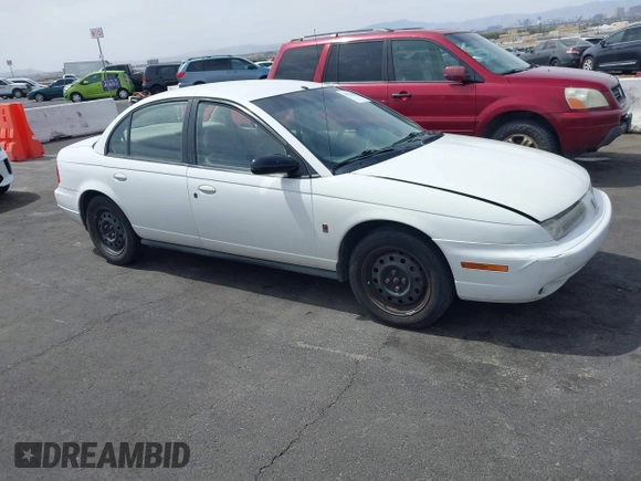 1998 Saturn SL z VIN 1G8ZJ5272WZ312413, wystawiony jako IAAI lot #41874493 z przebiegiem 229 200 mil mil oraz . Historia ofert i sprzedaży dostępna na DreamBid. Obrazek 13.