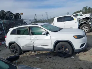 2019 Jeep Cherokee Latitude Plus with VIN 1C4PJLLX5KD403828, listed as a IAAI auction lot 41694076 with 85,718 mi miles and . Bid and sale history available at DreamBid. Image 13.