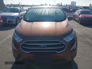2018 Ford EcoSport SE z VIN MAJ3P1TE5JC179602, wystawiony jako IAAI lot #42235541 z przebiegiem 55 477 mil mil oraz . Historia ofert i sprzedaży dostępna na DreamBid. Obrazek 6.