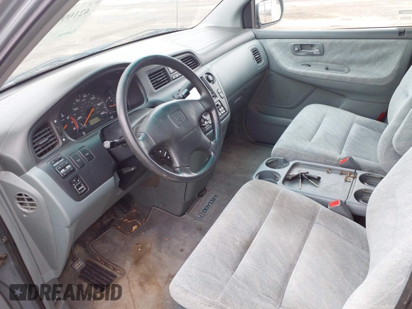 2000 Honda Odyssey EX z VIN 2HKRL1879YH516264, wystawiony jako IAAI lot #42109480 z przebiegiem 214 414 mil mil oraz . Historia ofert i sprzedaży dostępna na DreamBid. Obrazek 5.