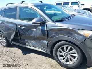 2017 Hyundai Tucson Value with VIN KM8J33A23HU405296, listed as a IAAI auction lot 41887237 with 114,027 mi miles. Bid and sale history available at carsss.com. Image 6.