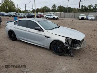 2015 BMW M6 z VIN WBS6C9C55FD467907, wystawiony jako Copart lot #72682374 z przebiegiem 25 841 mil mil oraz Szkoda całkowita • Salvage title. Historia ofert i sprzedaży dostępna na DreamBid. Obrazek 4.