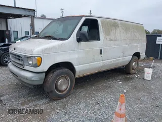 2002 Ford Econoline Cargo with VIN 1FTNE24L42HB67991, listed as a IAAI auction lot 40816497 with 310,862 mi miles. Bid and sale history available at carsss.com. Image 2.