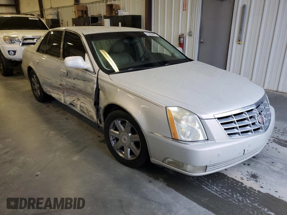 2007 Cadillac DTS V8 z VIN 1G6KD57YX7U201089, wystawiony jako Copart lot #44665825 z przebiegiem 117 048 mil mil oraz Szkoda całkowita • Salvage title. Historia ofert i sprzedaży dostępna na DreamBid. Obrazek 4.