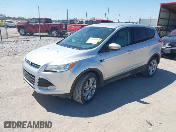 2013 Ford Escape SEL with VIN 1FMCU9H91DUA14749, listed as a IAAI auction lot 42039685 with 186,669 mi miles. Bid and sale history available at carsss.com. Image 2.
