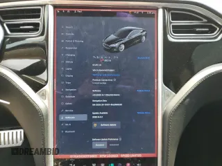 2014 Tesla Model S 60 with VIN 5YJSA1H11EFP36611, listed as a Copart auction lot 59544085 with 97,214 mi miles and Salvage title. Bid and sale history available at DreamBid. Image 9.