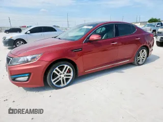 2013 Kia Optima SX z VIN 5XXGR4A60DG123851, wystawiony jako Copart lot #61150025 z przebiegiem 81 597 mil mil oraz Czysty tytuł • Clean title. Historia ofert i sprzedaży dostępna na DreamBid. Obrazek 1.