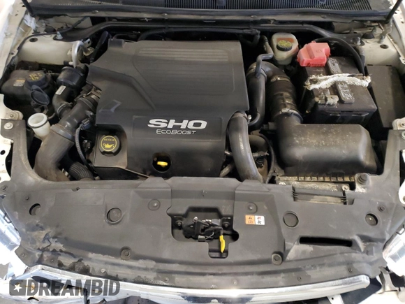 2015 Ford Taurus SHO z VIN 1FAHP2KT1FG157026, wystawiony jako Copart lot #52846065 z przebiegiem 125 107 mil mil oraz Szkoda całkowita • Salvage title. Historia ofert i sprzedaży dostępna na DreamBid. Obrazek 11.