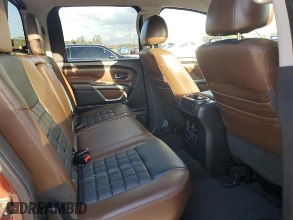 2016 Nissan Titan SL z VIN 1N6BA1F2XGN506885, wystawiony jako Copart lot #43457125 z przebiegiem 51 323 mil mil oraz Szkoda całkowita • Salvage title. Historia ofert i sprzedaży dostępna na DreamBid. Obrazek 10.