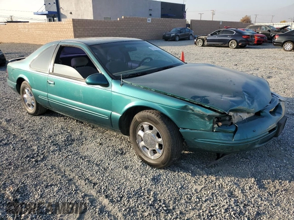 1997 Ford Thunderbird LX z VIN 1FALP62W4VH170423, wystawiony jako Copart lot #83379614 z przebiegiem 93 117 mil mil oraz Szkody całkowita. Historia ofert i sprzedaży dostępna na DreamBid. Obrazek 4.