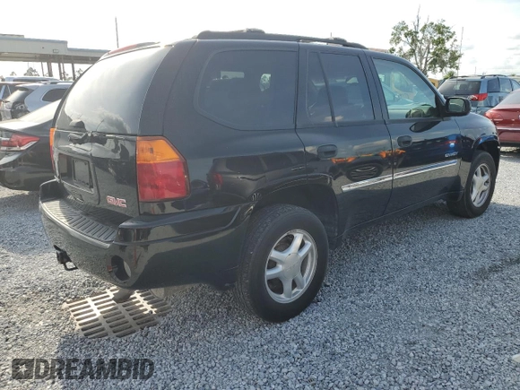 2006 GMC Envoy SLE z VIN 1GKDS13S062176000, wystawiony jako Copart lot #57672995 z przebiegiem 161 455 mil mil oraz Szkoda całkowita • Salvage title. Historia ofert i sprzedaży dostępna na DreamBid. Obrazek 3.