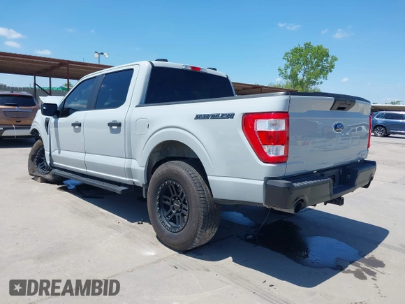2023 Ford F-150 XL with VIN 1FTFW1E84PFA48461, listed as a IAAI auction lot 42096361 with 52,354 mi miles and . Bid and sale history available at DreamBid. Image 3.